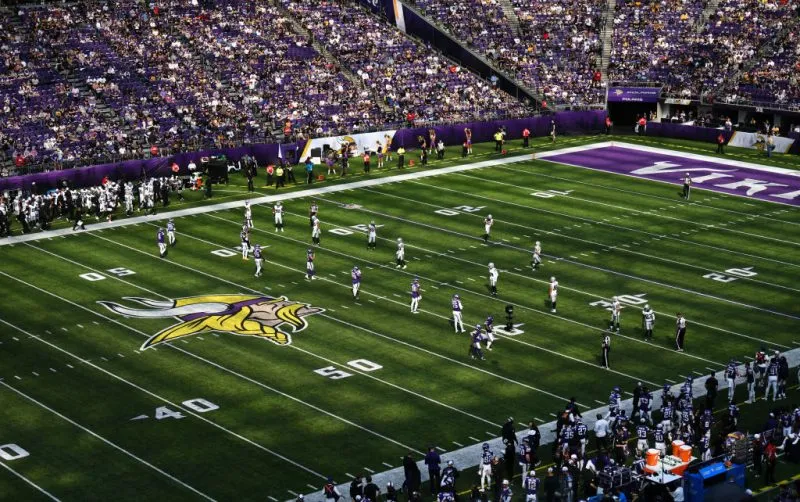 two teams playing in crowded ground